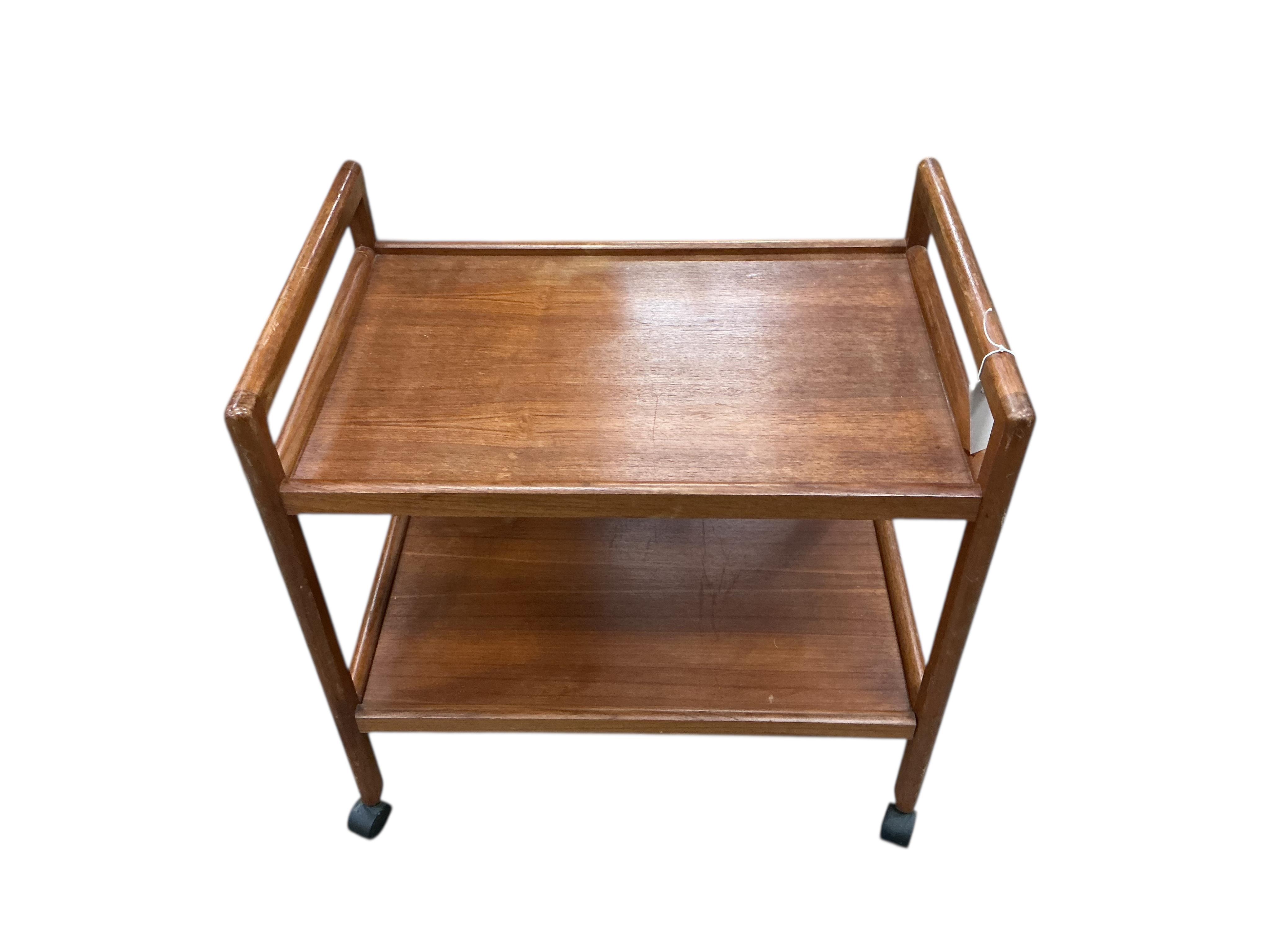 A mid century rectangular teak two tier tea trolley, width 70cm, depth 47cm, height 70cm